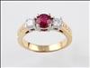 18ct yellow and white gold ruby and diamond three stone ring with diamond set shoulders