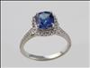 18ct white gold tanzanite and diamond cluster ring with diamond set shoulders