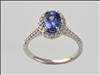 9ct white gold tanzanite and diamond cluster ring with diamond set shoulders